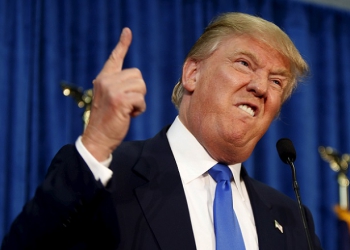 Republican presidential candidate Donald Trump gestures and declares "You're fired!" at a rally in Manchester, New Hampshire, June 17, 2015.  REUTERS/Dominick Reuter      TPX IMAGES OF THE DAY      - RTX1GZCO