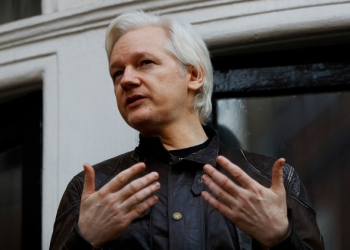 WikiLeaks founder Julian Assange is seen on the balcony of the Ecuadorian Embassy in London, Britain, May 19, 2017. REUTERS/Peter Nicholls