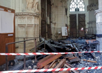 A view of debris caused by a fire inside the Cathedral of Saint Pierre and Saint Paul in Nantes, France, July 18, 2020. REUTERS/Stephane Mahe