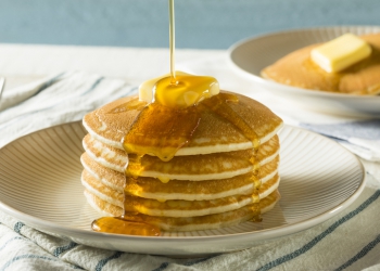 Sweet Homemade Stack of Pancakes with Butter and Syrup for Breakfast