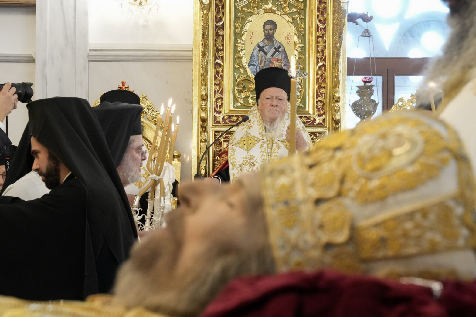 The leader of the world's Orthodox Christians Patriarch Bartholomew presides over the funeral ceremony of the late Head of Cyprus' Orthodox Church, Archbishop Chrysostomos II, at Saint Barnabas Cathedral, in Nicosia, Cyprus, Saturday, Nov. 12, 2022. The outspoken Chrysostomos whose forays into the country's complex politics and finances fired up supporters and detractors alike, died Monday at the age of 81. (AP Photo/Petros Karadjias)