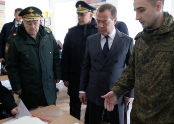 Deputy head of Russia's Security Council Dmitry Medvedev visits a military enlistment office in the Leningrad region, Russia, March 16, 2023. Sputnik/Ekaterina Shtukina/Pool via REUTERS ATTENTION EDITORS - THIS IMAGE WAS PROVIDED BY A THIRD PARTY.