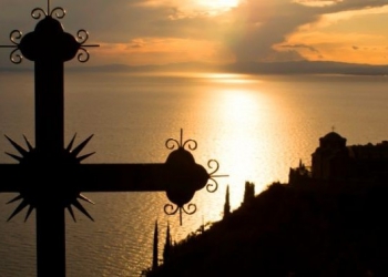 Cross at sunset on Mount Athos, Greece