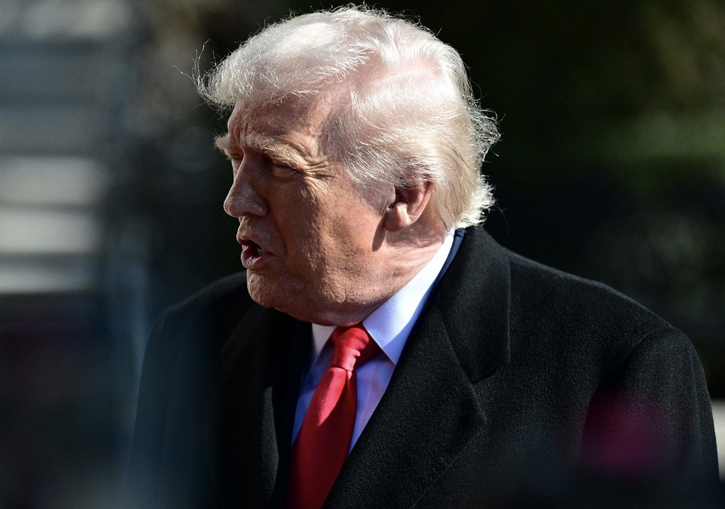 President of the United States Donald J. Trump speaks to reporters prior to departing the White House on Marine One in Washington, DC, USA, on February 13, 2026. On Friday afternoon, President Trump comments about Venezuela, the economy, immigration, and other news of the day. (Photo by Kyle Mazza/Thenews2/NurPhoto) (Photo by Thenews2, Kyle Mazza / NurPhoto via AFP)